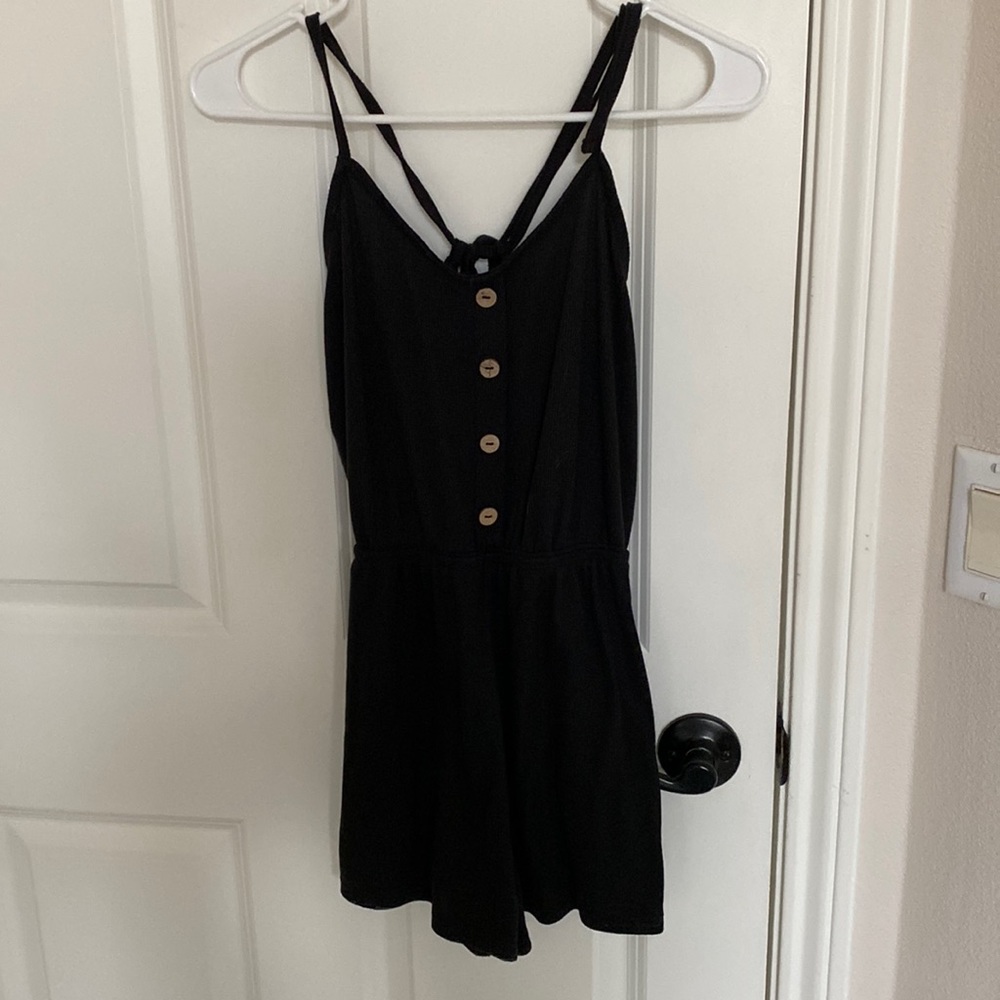 Small black button up romper! Never worn